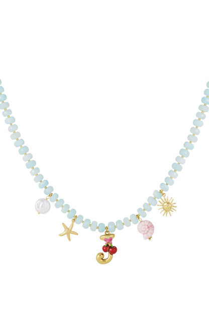 Light blue beaded necklace with gold charms: initial J, cherry, starfish, sun, shell, and pearl on white background.