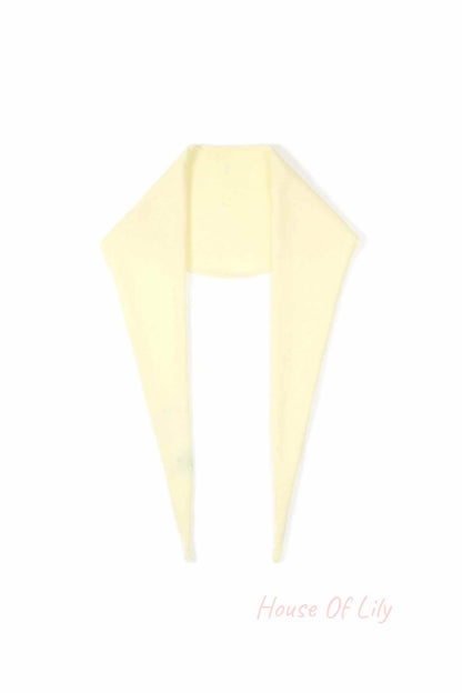 Pale yellow soft knit triangle scarf displayed flat