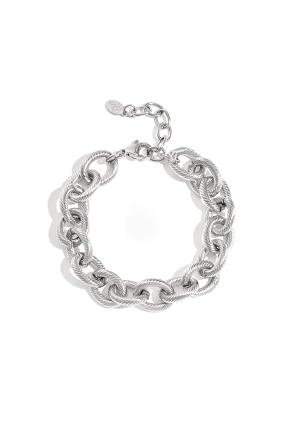 Silver twisted link chain bracelet laid flat featuring lobster clasp and extender chain