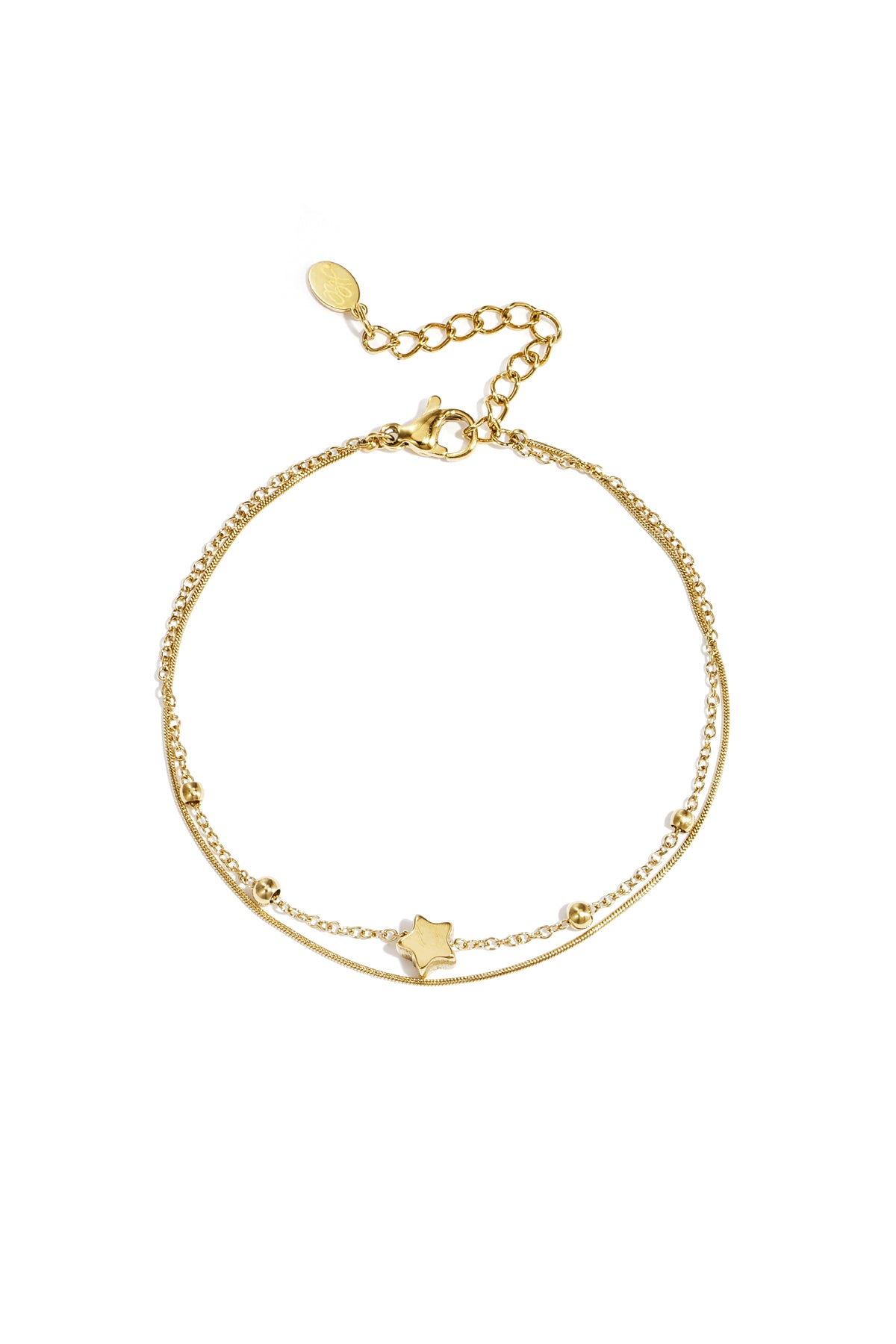 Gold-tone delicate double chain bracelet with star charm, laid flat on a white background showing lobster clasp and extension chain.