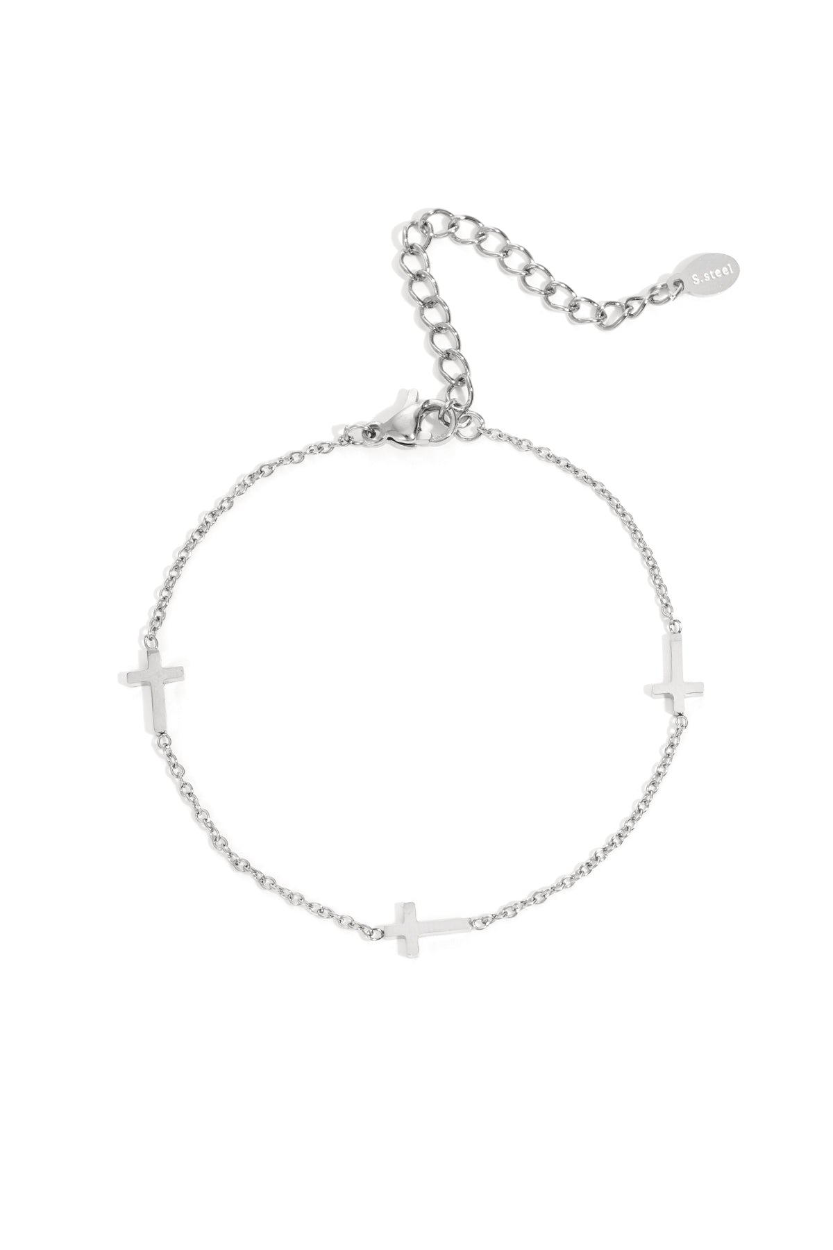 Silver stainless steel delicate chain bracelet with three small cross charms and an adjustable clasp.