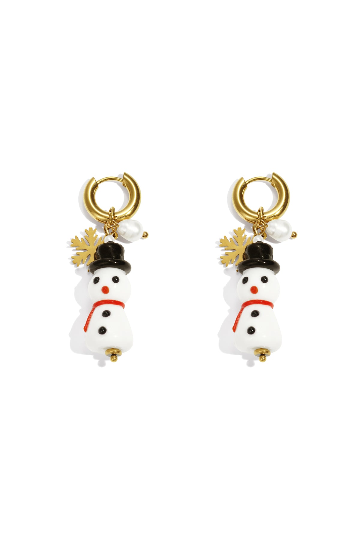 Pair of gold-tone hoop drop earrings with dangling white resin snowman charms wearing black hats and red scarves, accented with gold snowflake and faux pearl.