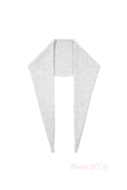 Light gray soft knit triangle scarf laid flat
