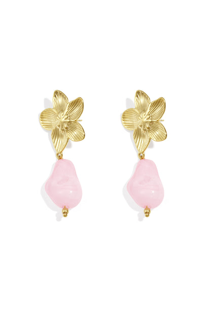 Pair of gold-tone flower drop earrings with light blue organic acrylic bead on white background