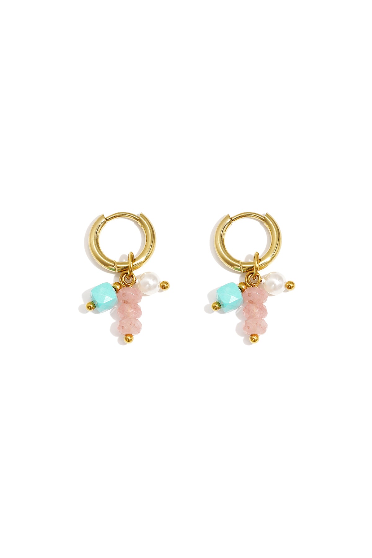 Pair of gold hoop earrings adorned with pink, turquoise, and pearl beads laid flat on white background