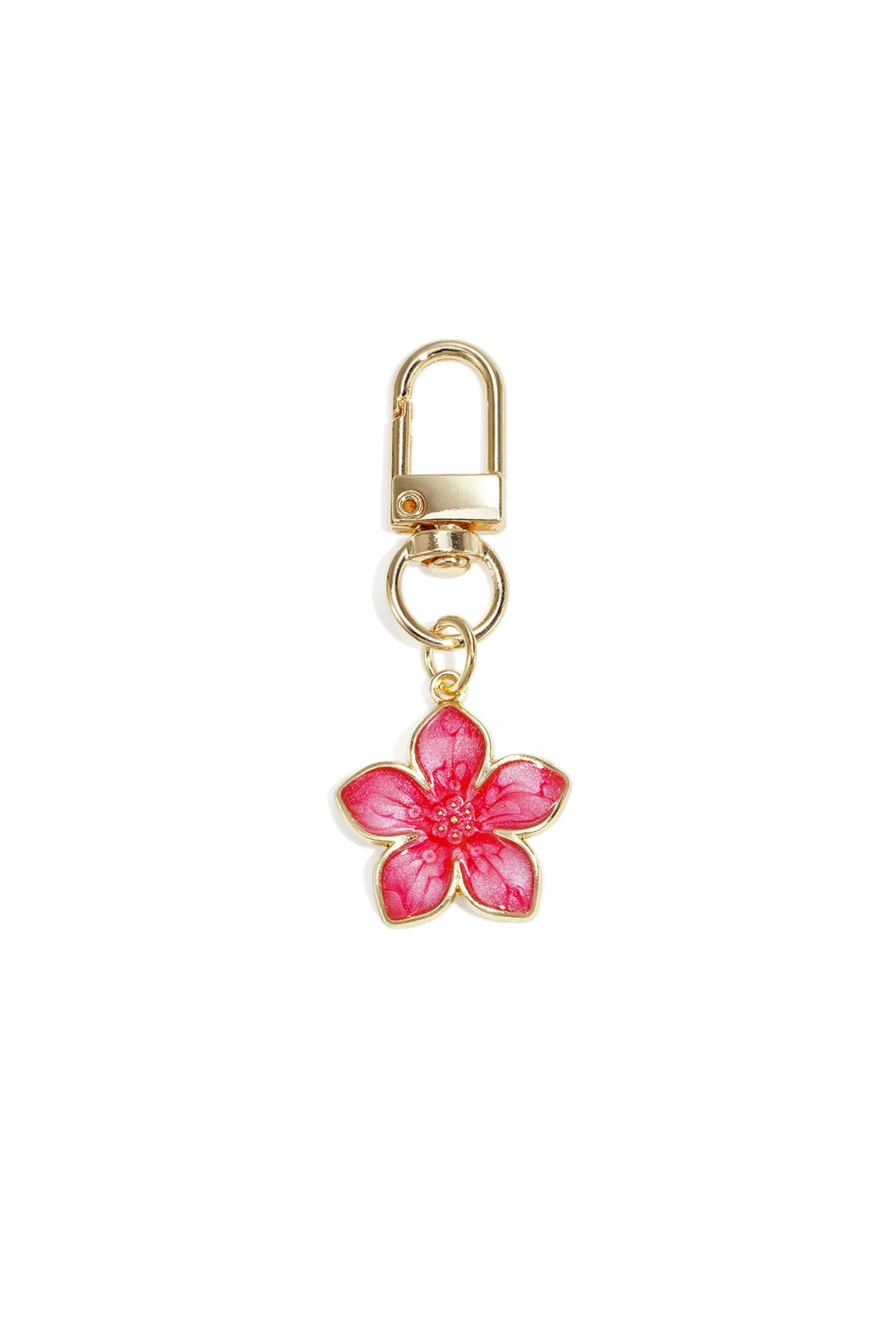 Gold alloy keyring with vibrant pink enamel blossom flower charm on white background