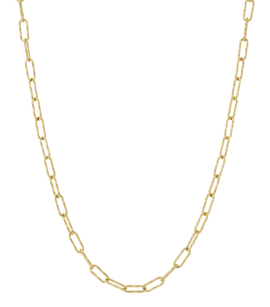Close-up of gold-colored textured rectangular link chain necklace on white background