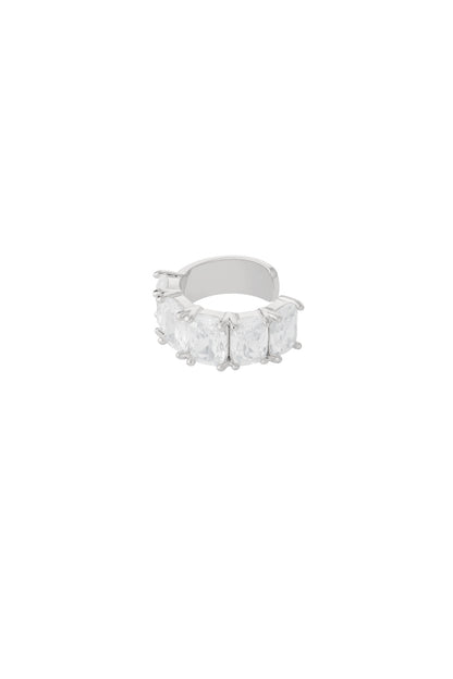 Silver-tone ear cuff with five large clear rectangular stones set in prongs, isolated on white background