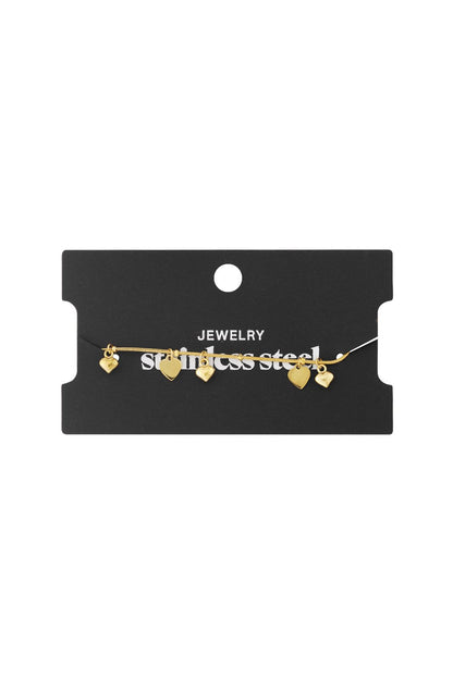 Gold-tone stainless steel dainty chain bracelet featuring five small, polished heart-shaped charms.