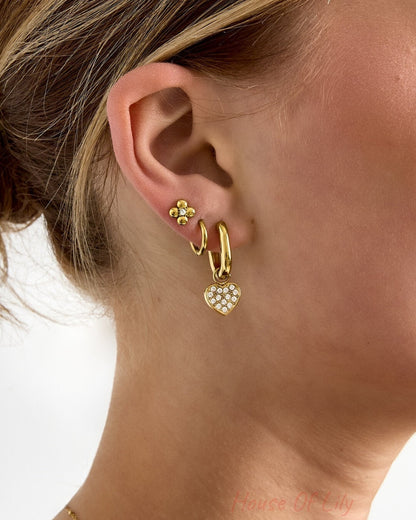 Squoval earrings with set heart charms