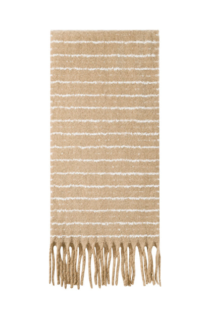 Beige striped winter scarf with fringe tassels laid flat on white background