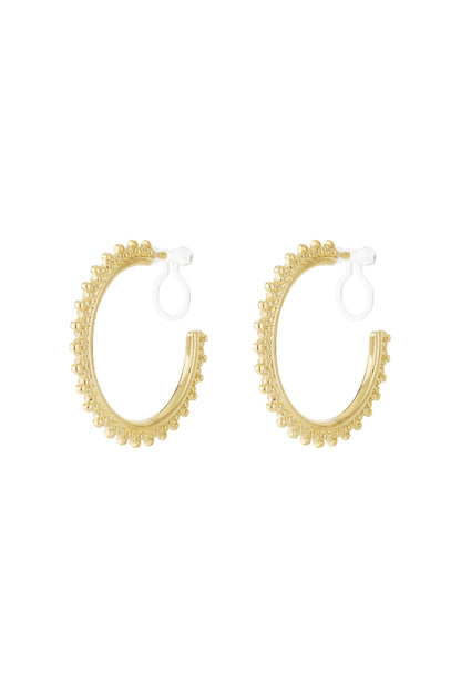 Pair of gold beaded edge clip-on hoop earrings on a white background