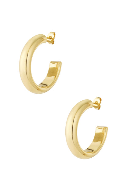 Pair of chunky gold-tone hoop earrings with sleek rounded design on white background