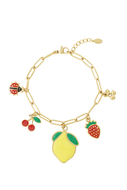 Gold-plated charm bracelet with enamel fruit charms including lemon, cherries, strawberry, and a ladybug on a white background