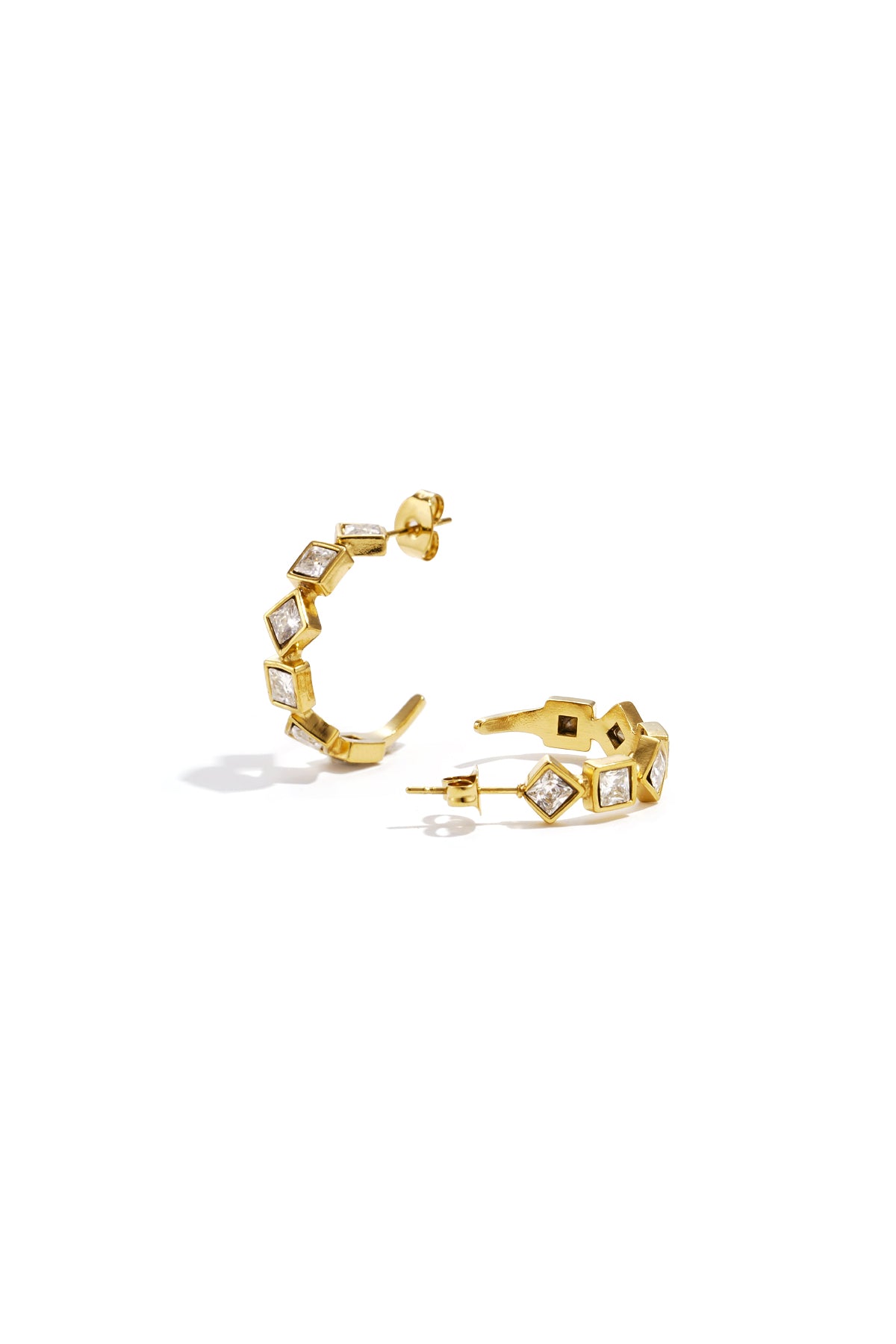 Pair of gold tone square rhinestone hoop earrings displayed on white background