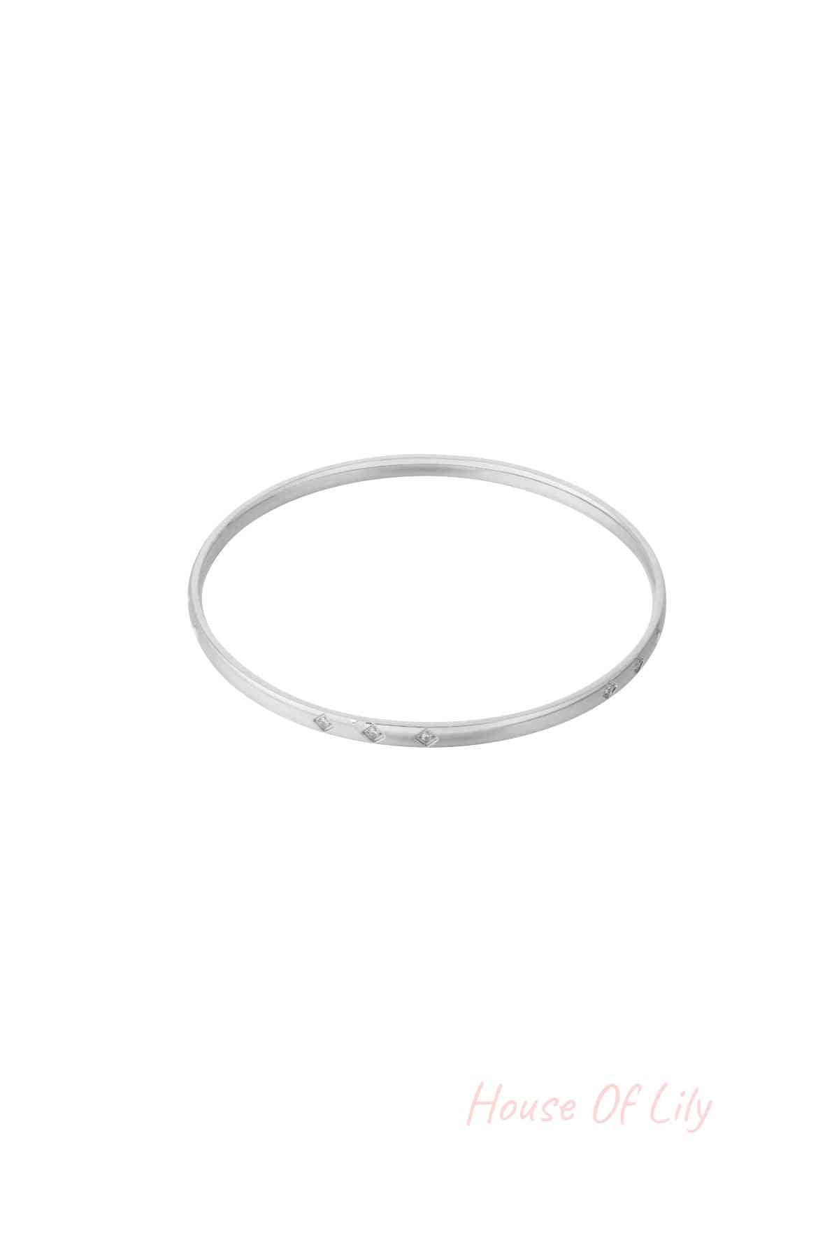 Silver mini diamond bangle with subtle rhinestone accents shown on white background