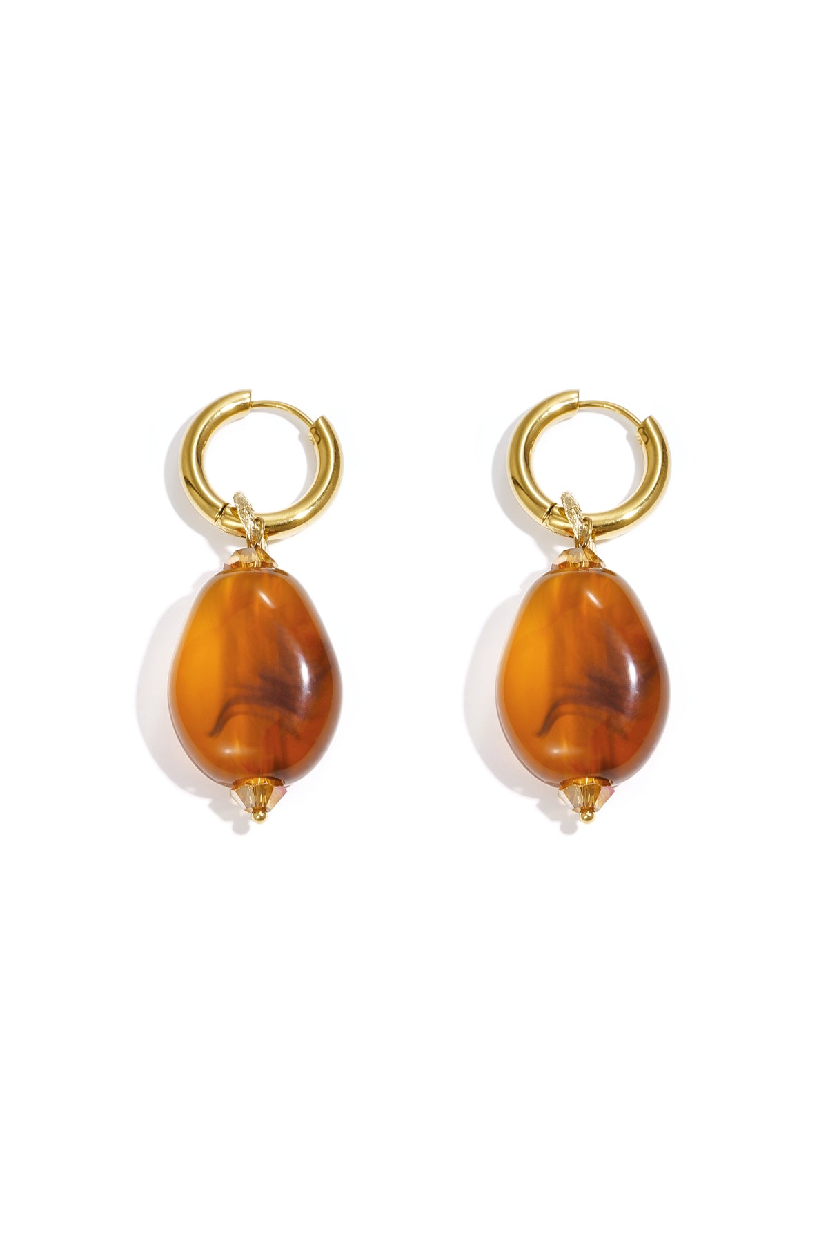 Pair of gold hoop earrings with amber cloudy resin beads
