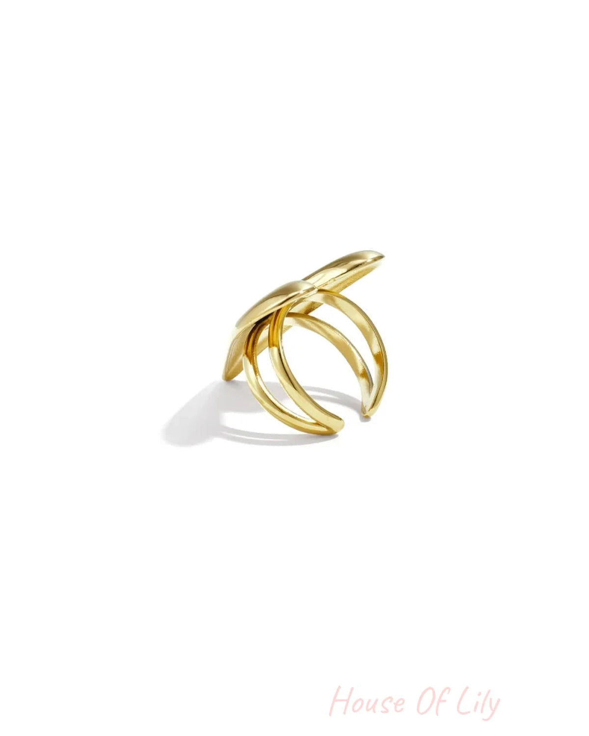 Polished gold multi-band ring with a smooth, organic, leaf-like top design.