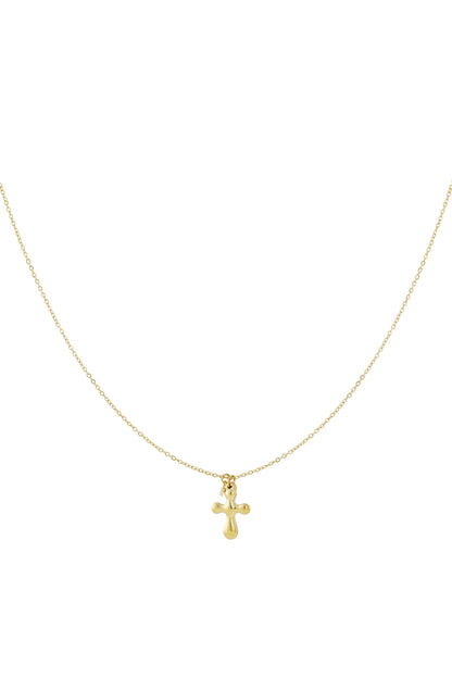 Minimal gold cross pendant necklace with thin chain on white background