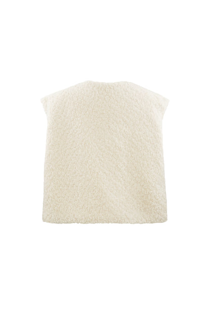 Front view of camel sherpa vest on white background highlighting smooth woven inner lining and plush exterior