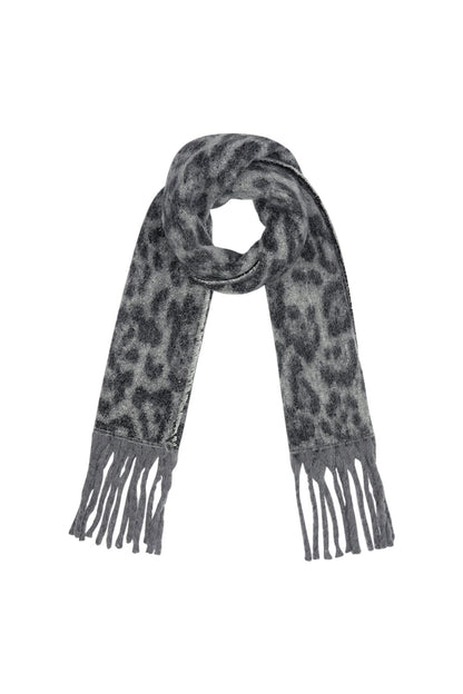 Gray leopard print scarf with fringe detail laid flat in a loop