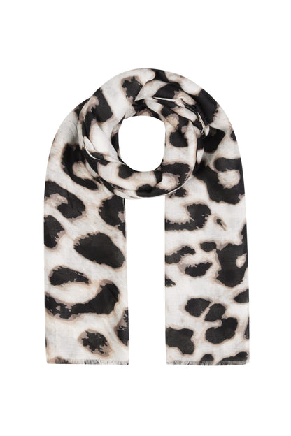 Leopard print scarf in black and white rolled and laid flat on white background