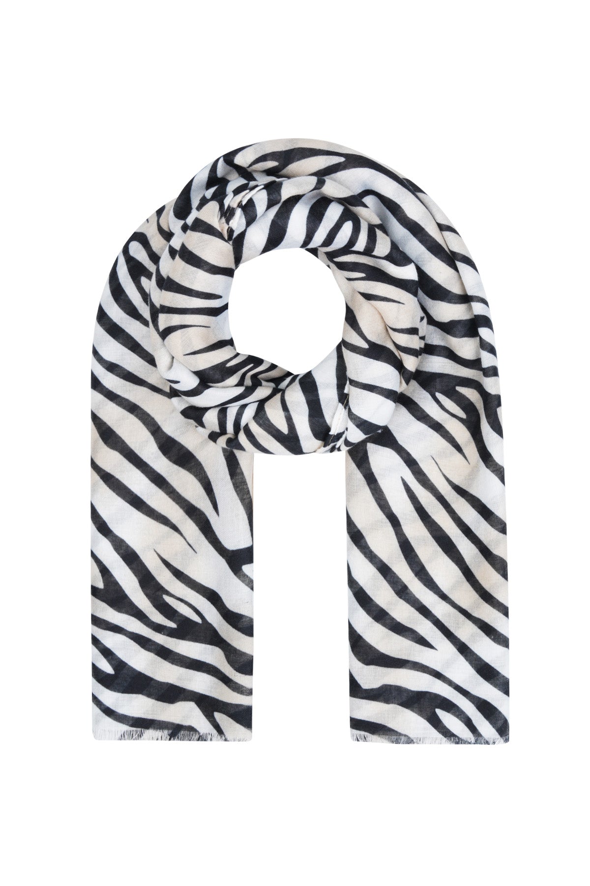 Zebra print scarf with bold black and white stripes folded in a looped style on white background