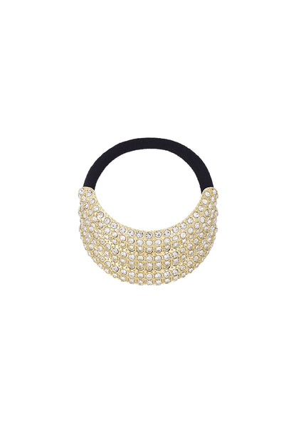 Close-up of a crystal-embellished gold-tone hair elastic with black band on white background
