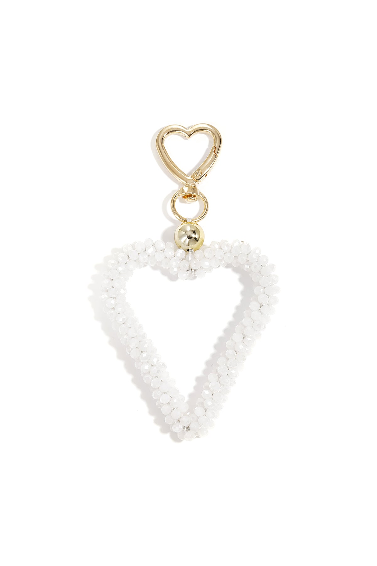 White beaded open heart keychain attached with gold hardware on white background