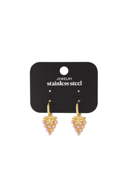 Gold grape drop earrings with pastel pink enamel displayed on a black stainless steel jewelry card