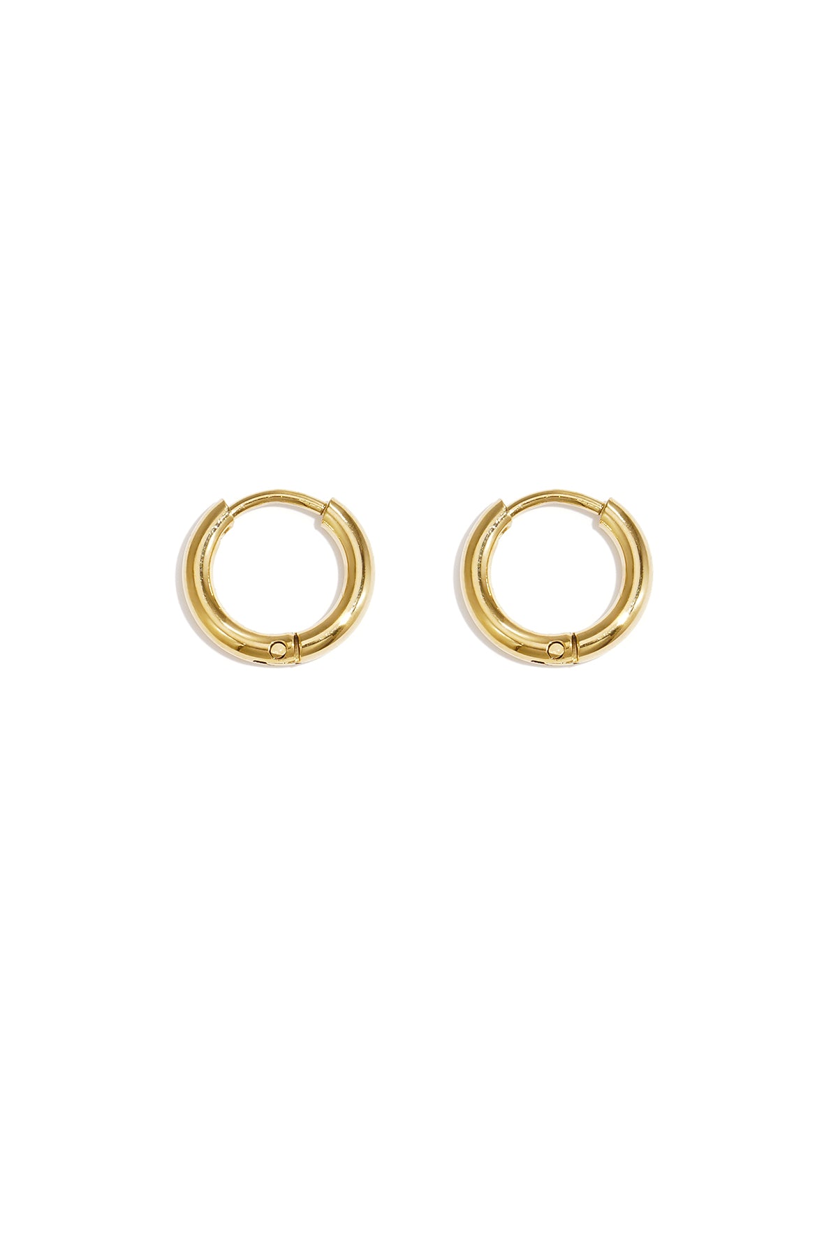 Pair of polished gold minimalist hoop earrings on white background