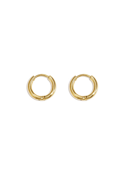 Pair of polished gold minimalist hoop earrings on white background