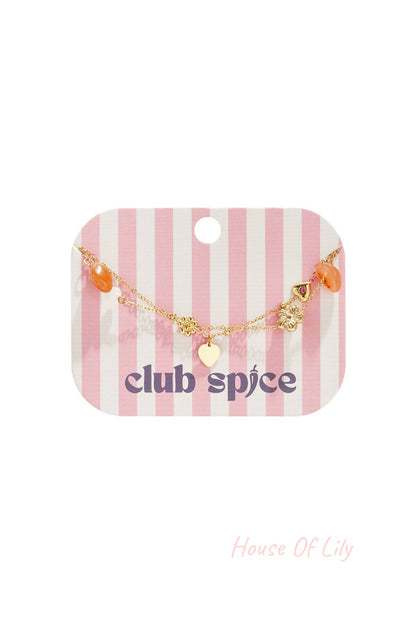 Charm bracelet with orange beads, flowers and hearts