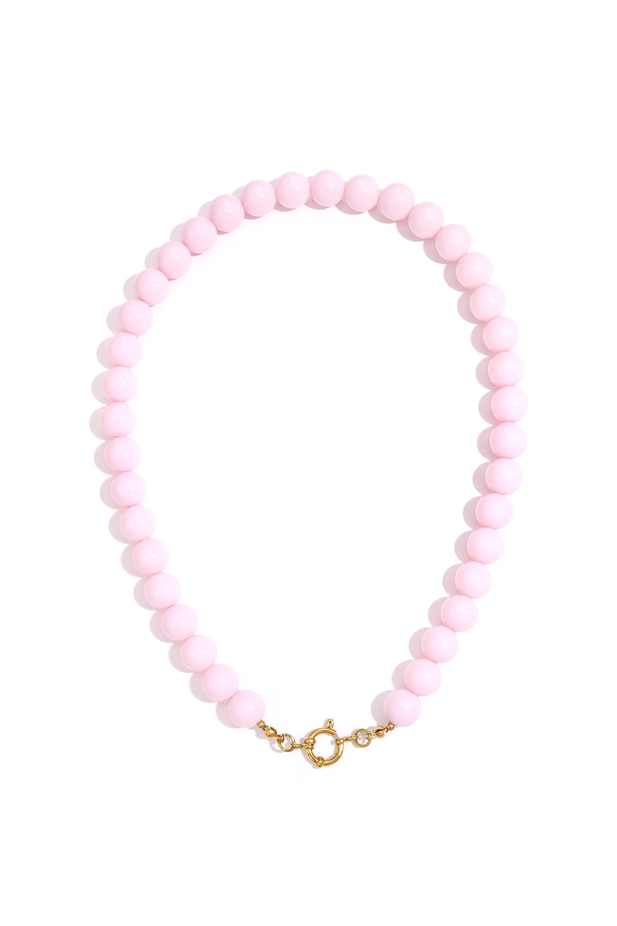 Single strand necklace with glossy coral resin beads and gold spring ring clasp on white background
