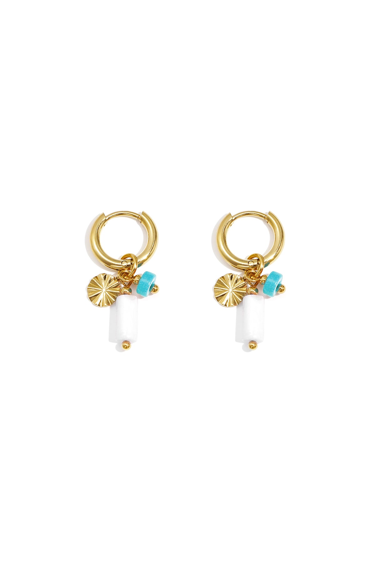 Gold-tone hoop earrings with turquoise and white stone bead and textured disc charm on white background