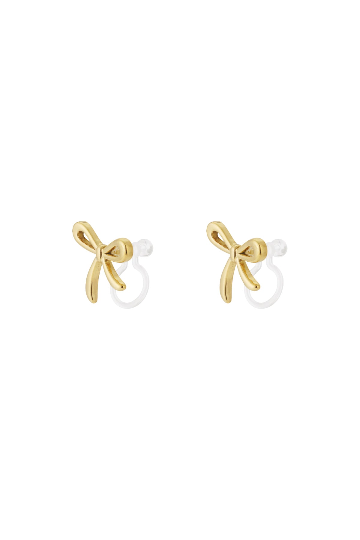 Pair of gold bow-shaped clip-on earrings with smooth polished finish on white background