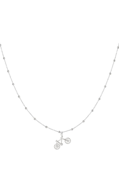 Silver bicycle pendant necklace with beaded chain on white background