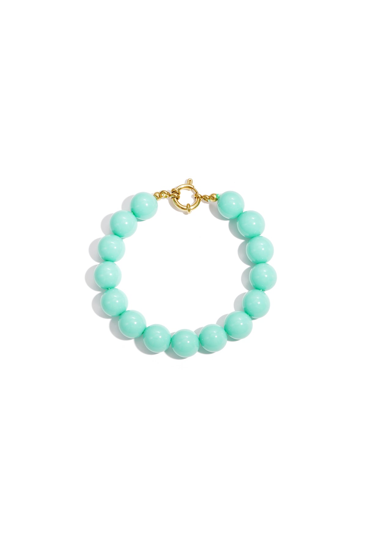 Vibrant teal resin bead bracelet with a gold-tone circular clasp, isolated on a white background.