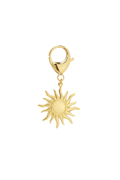 Close-up view of a gold-tone sun keychain charm with a lobster clasp attachment against a white background