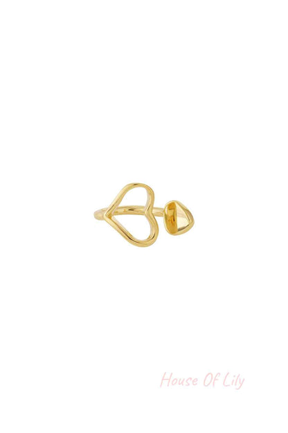 Gold-tone heart-shaped open ring with a small rounded end detail