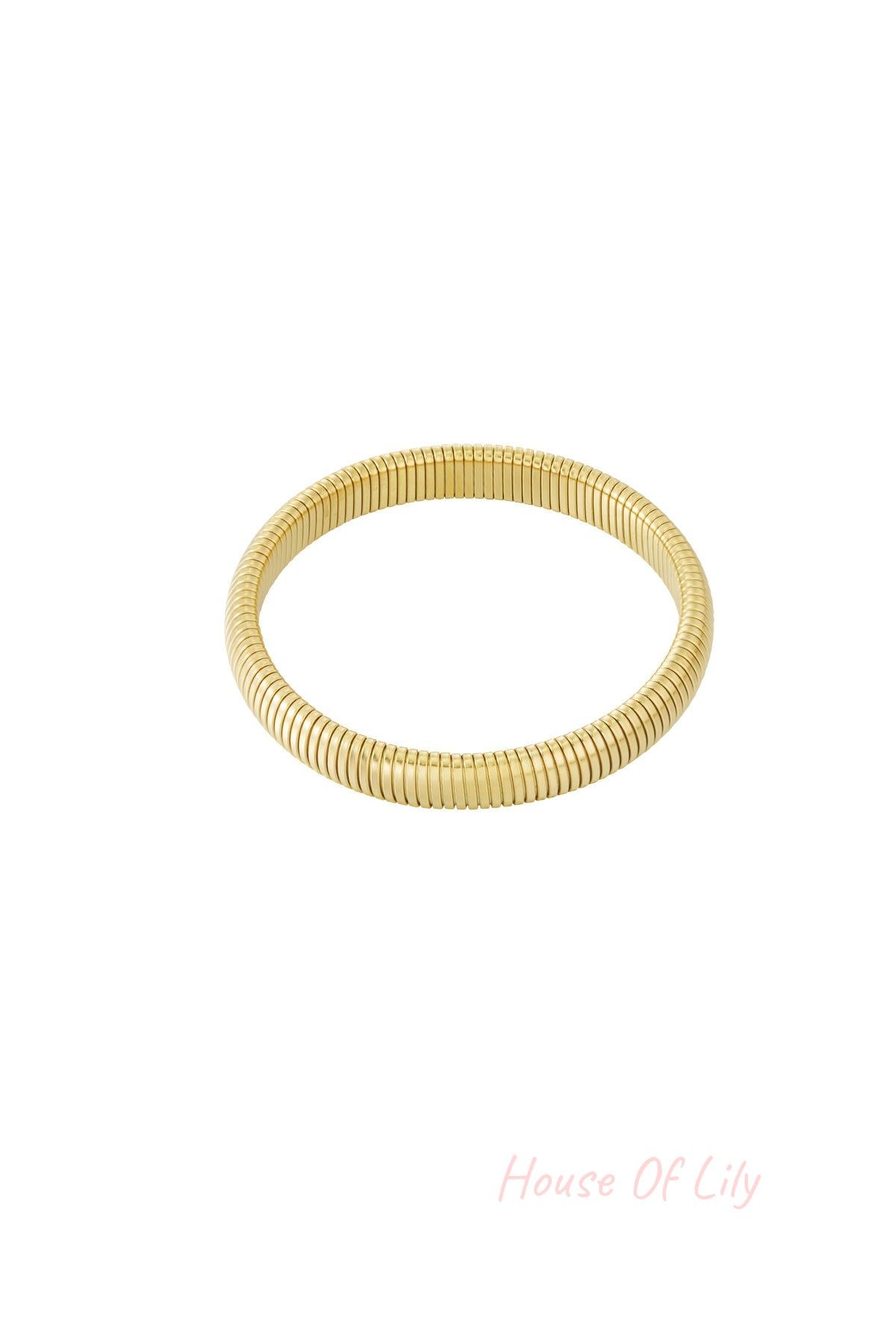 Another angle of the gold stretch bracelet showing its flexible segmented design on white background