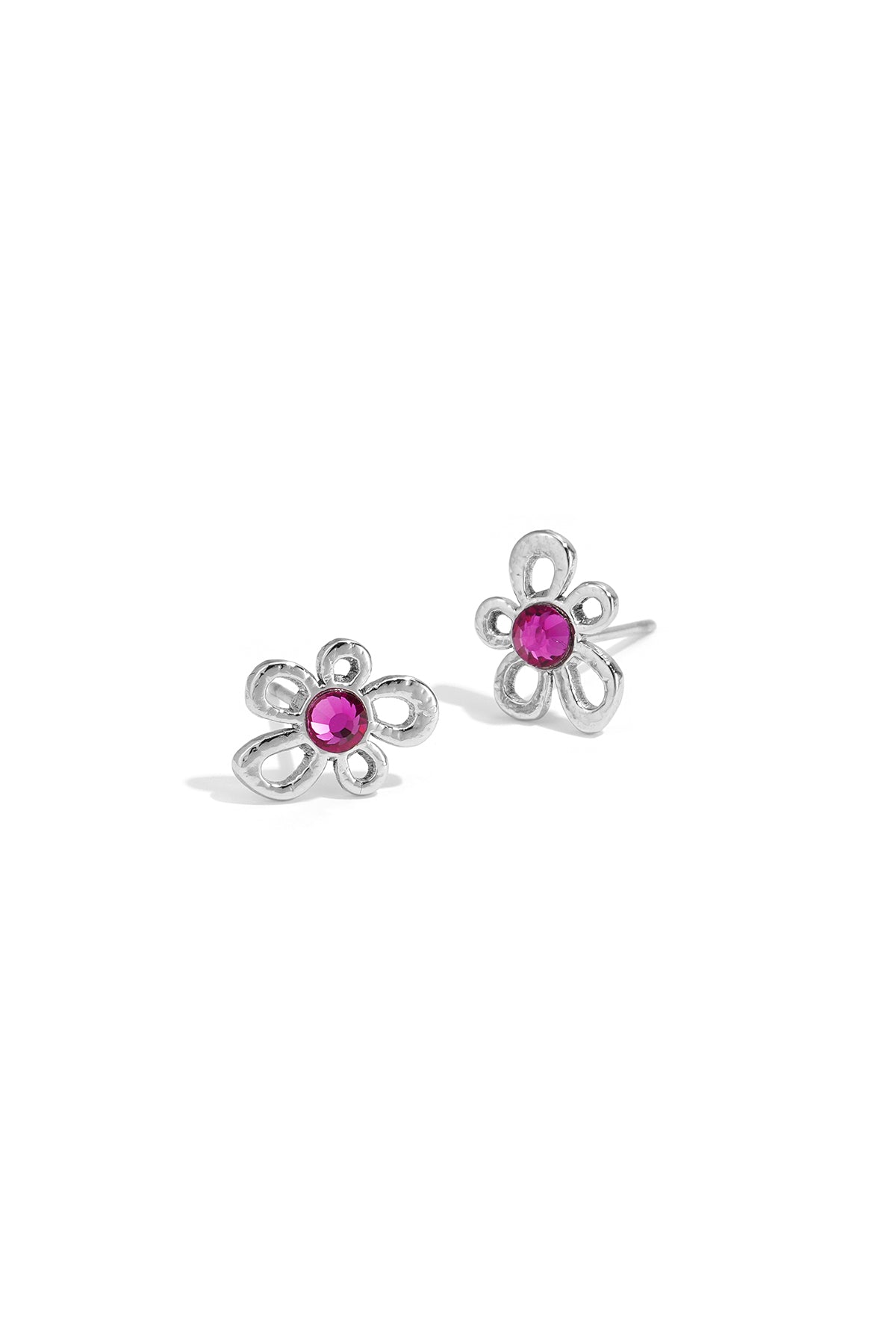 Silver-tone floral stud earrings with open petal design and fuchsia rhinestone center on white background
