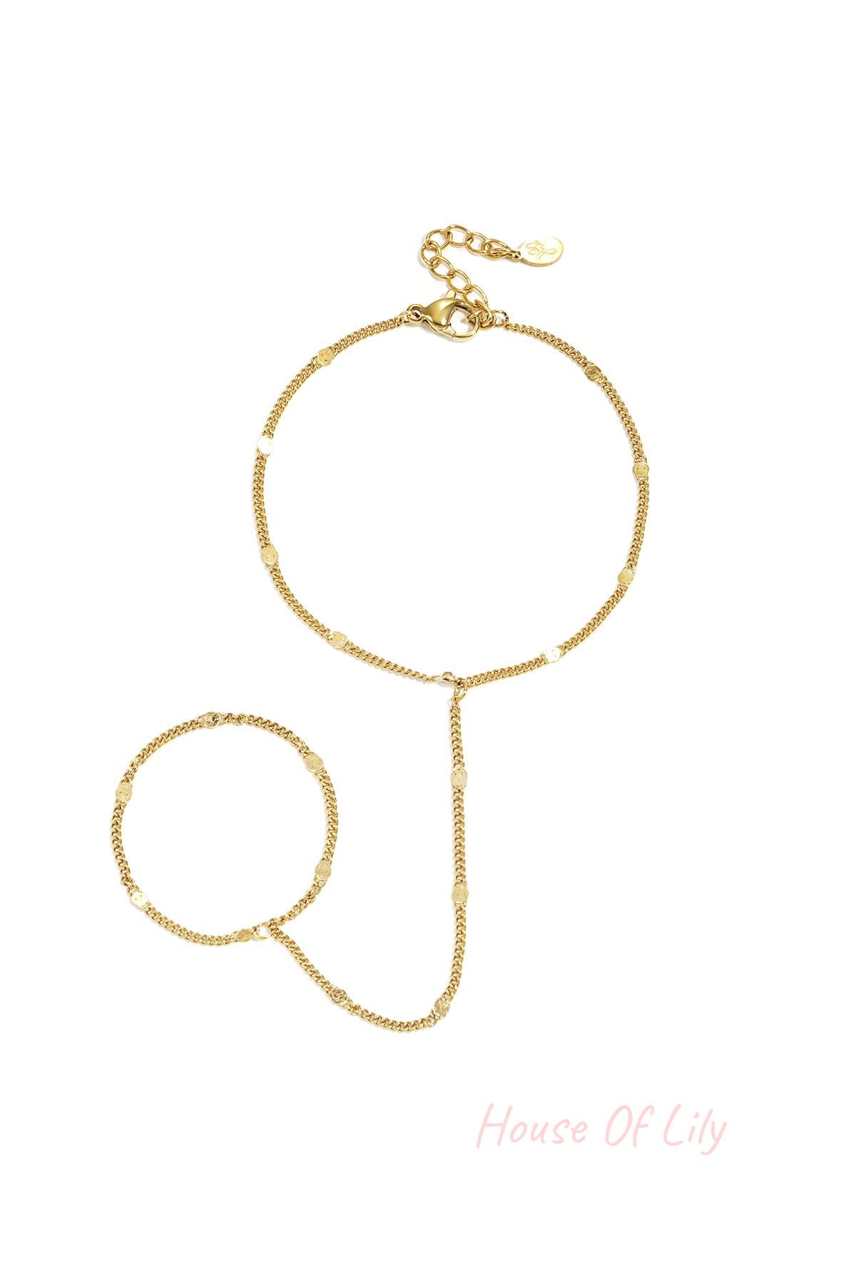 Delicate gold chain hand bracelet with small shimmering discs and adjustable lobster clasp