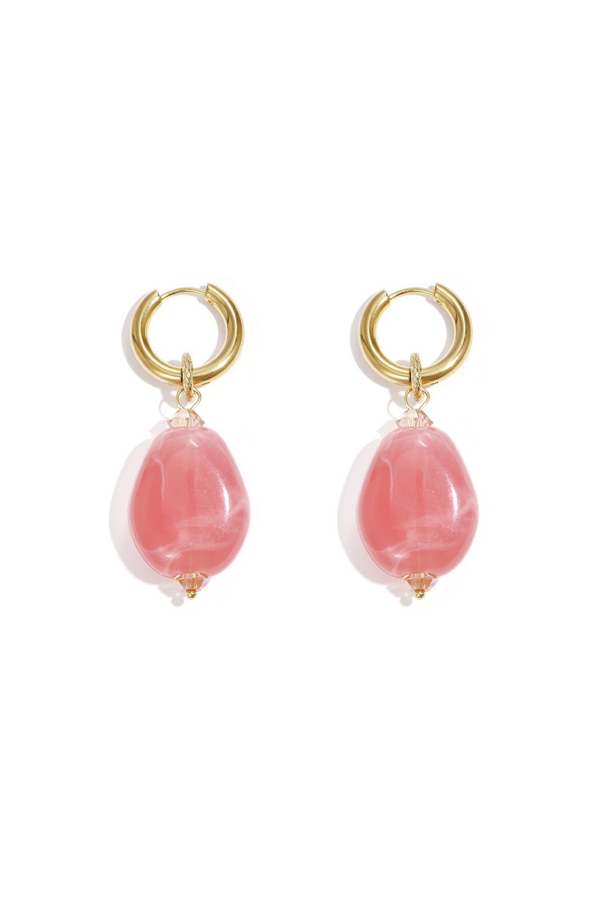 Pair of gold hoop earrings featuring soft rose pink cloudy resin beads