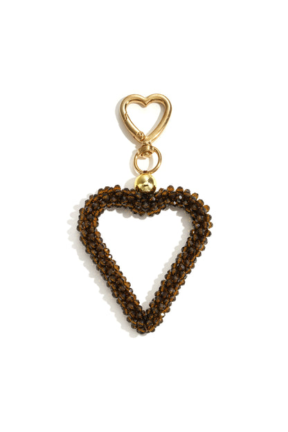 Dark brown beaded heart keychain with gold clasp on white background