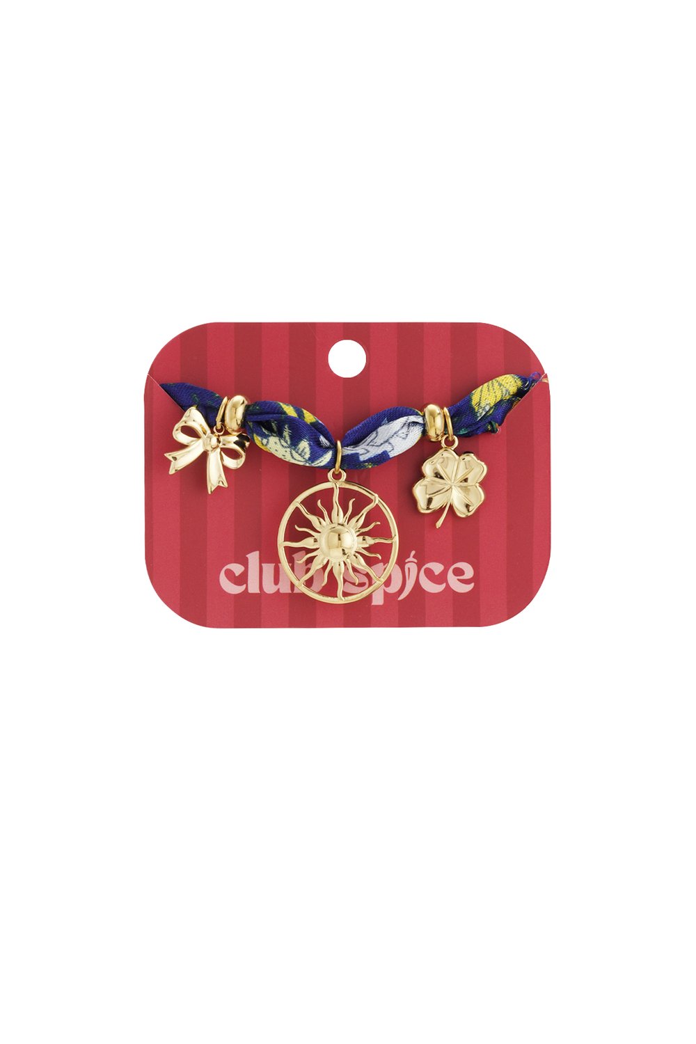 Floral print fabric bracelet with gold charms including a bow, sun, and four-leaf clover on a red display card.