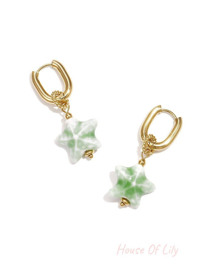 Squoval earrings with colored star pendant