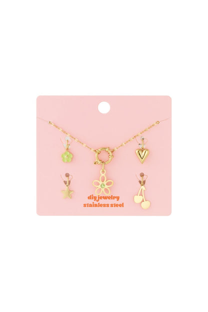 Gold stainless steel necklace with a flower charm and four mix-and-match charms: flower, heart, star, and cherries.