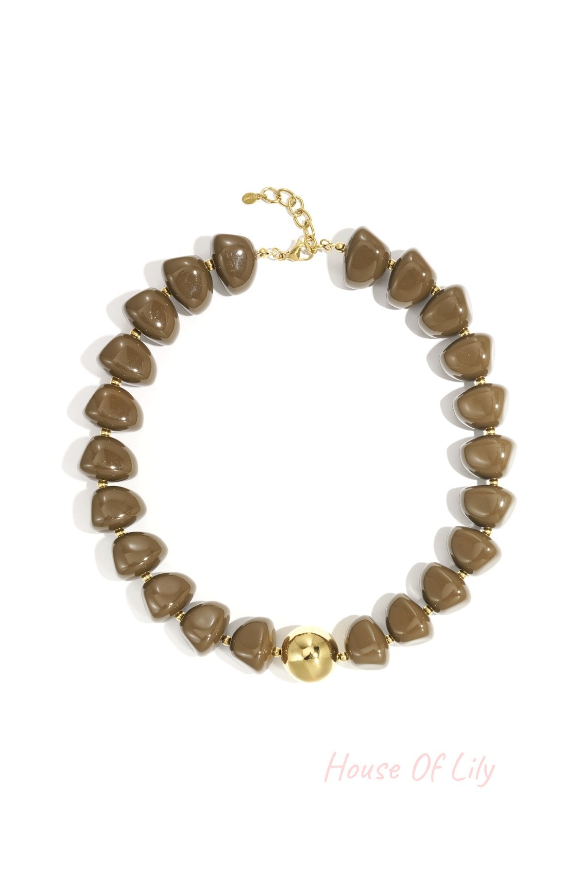 Close-up of a chunky brown beaded necklace with gold clasp and centerpiece bead on white background
