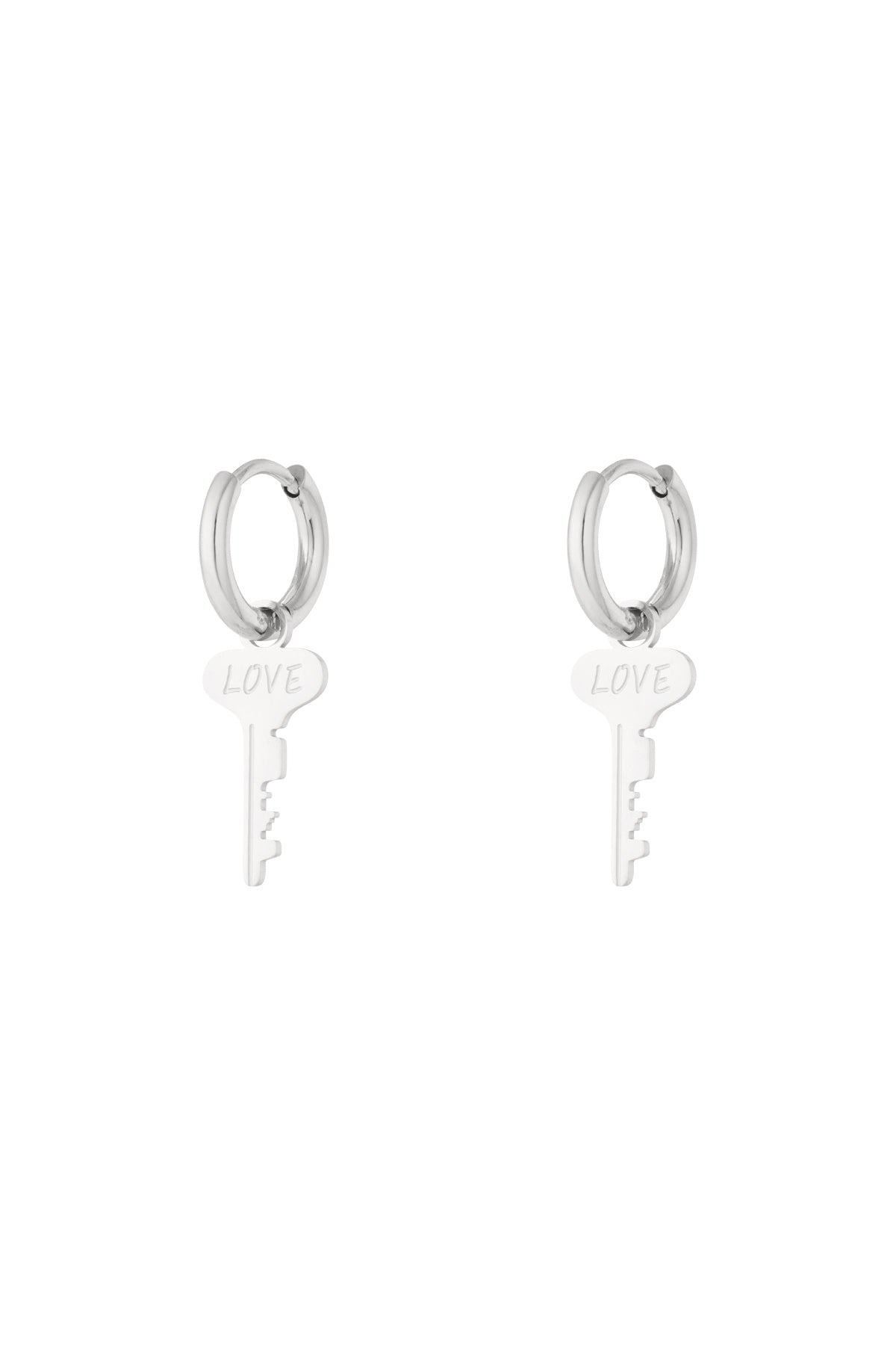 Pair of silver hoop earrings with dangling key-shaped charms engraved with the word 'LOVE' on a white background